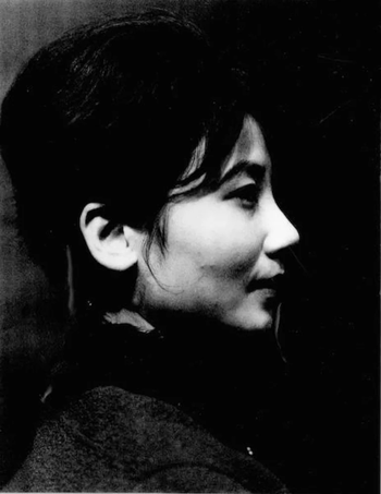 Black and white portrait of a Japanese woman in profile, the artist Mieko Shiomi