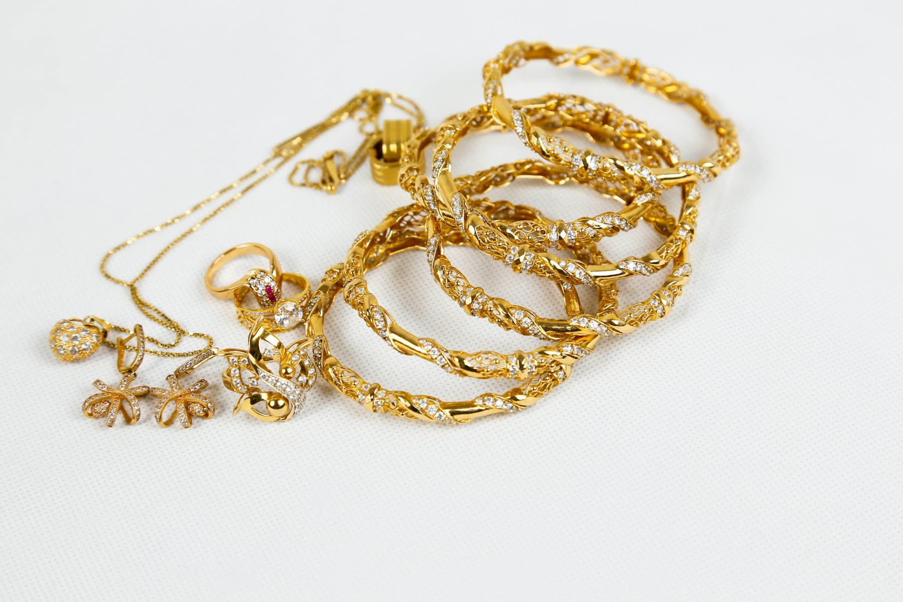 Thin gold bangles and rings