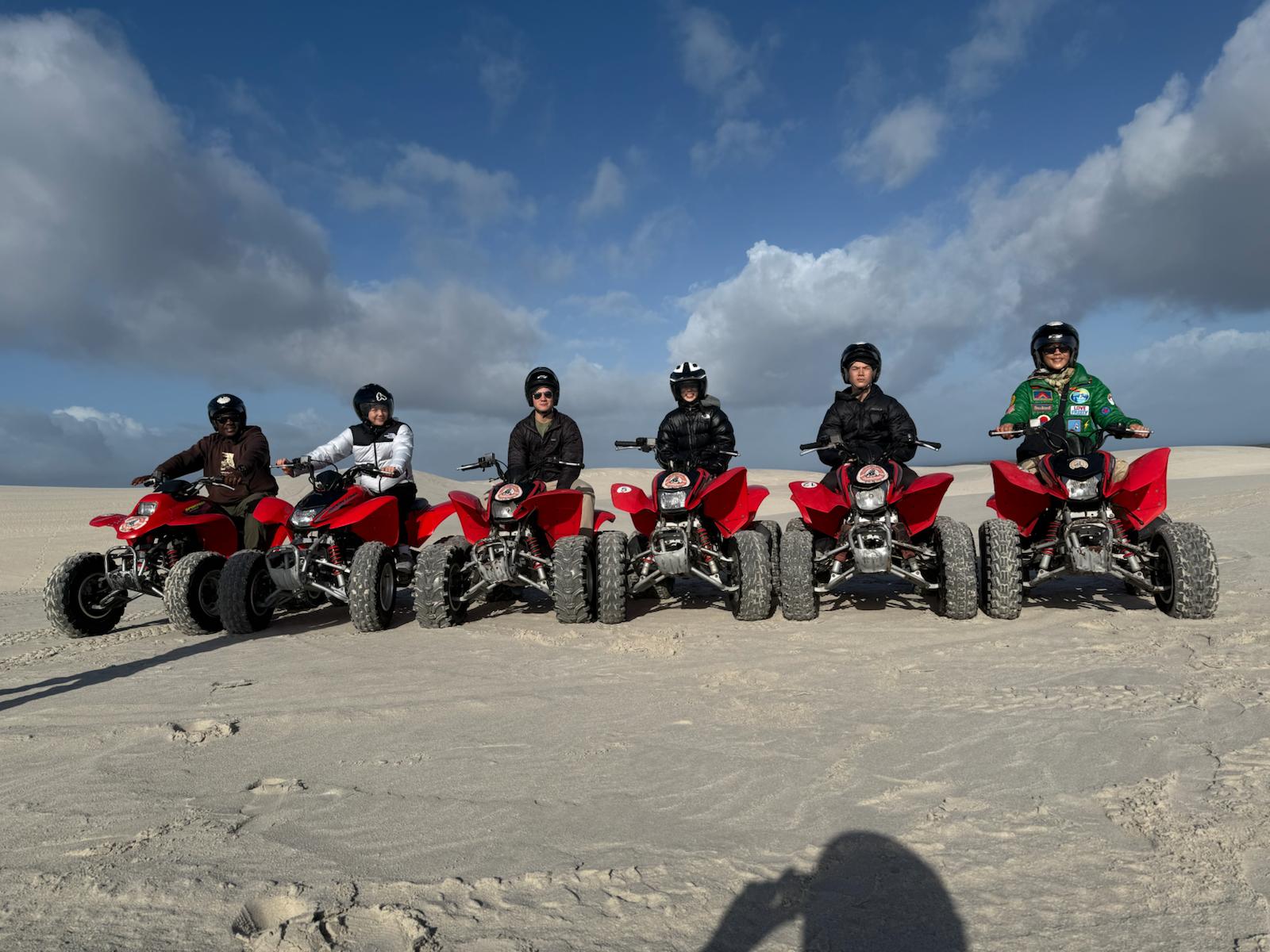 Guide leading the group over a dune