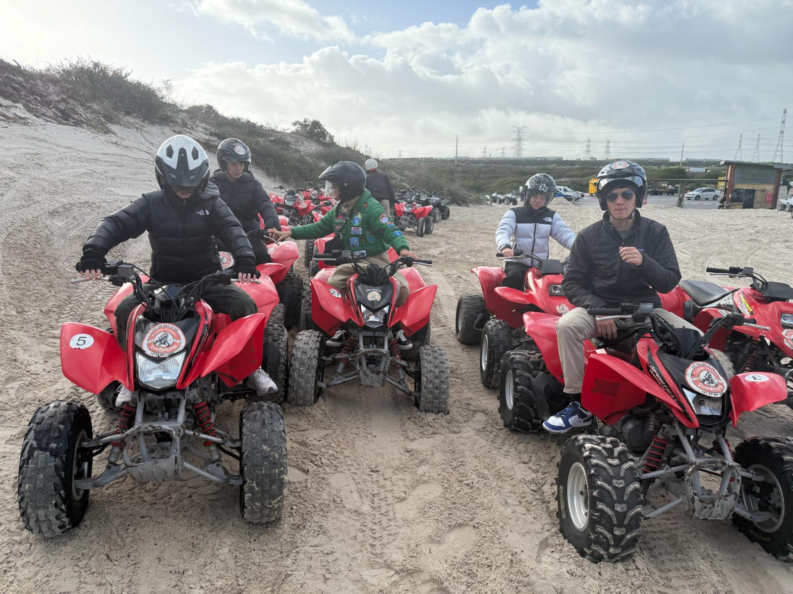Wide dunes landscape with riders