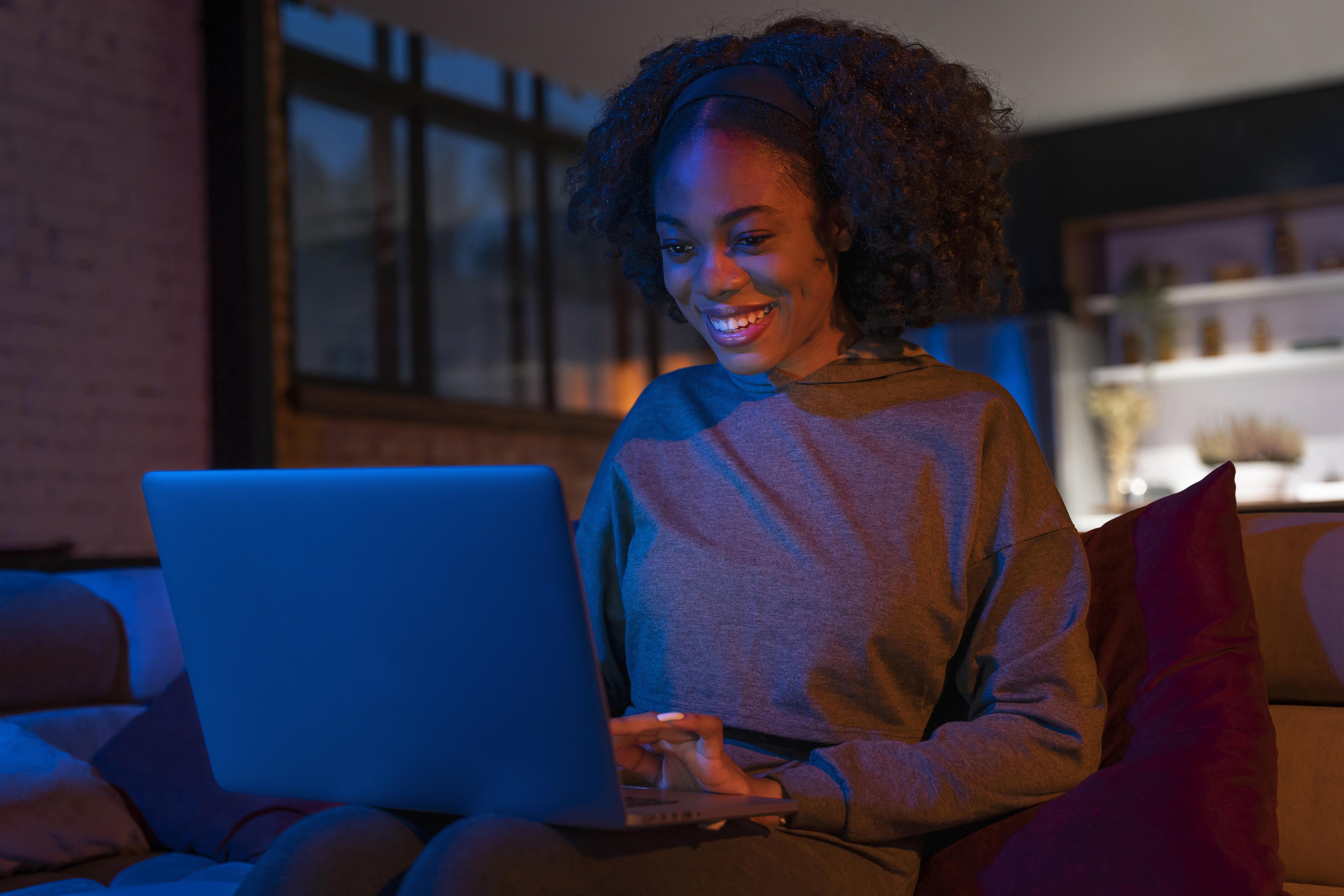 Woman holding laptop