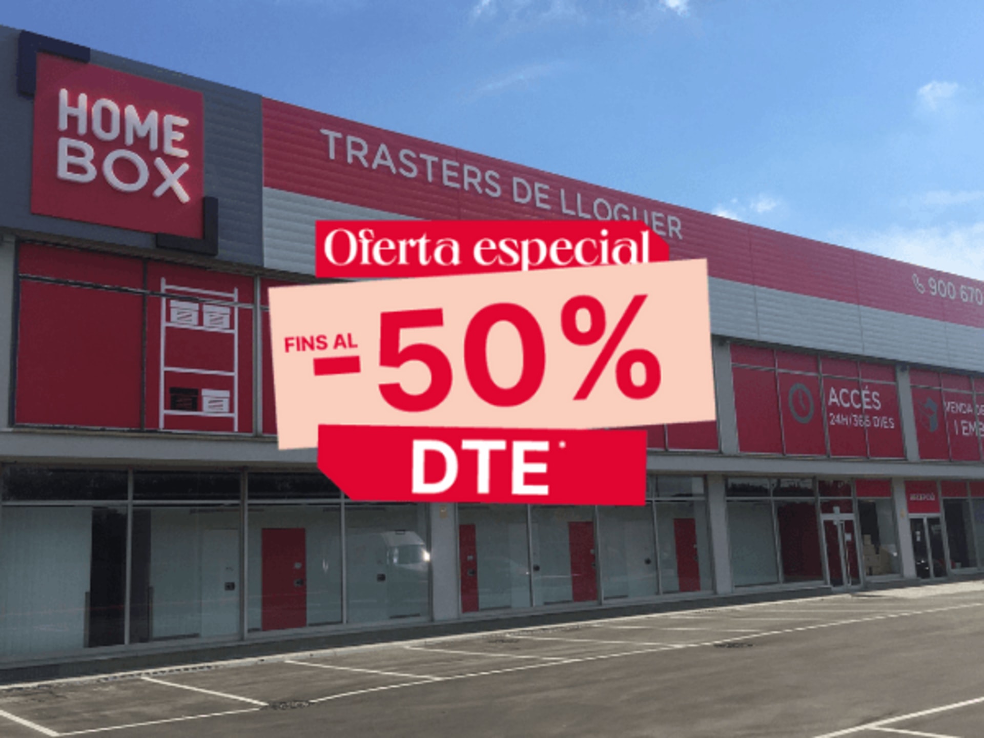 Façana vermella del centre amb rètol HOMEBOX i accés amb aparcament del centre HOMEBOX Barcelona El Prat, Carretera Ca l'Alaio 5, El Prat de Llobregat