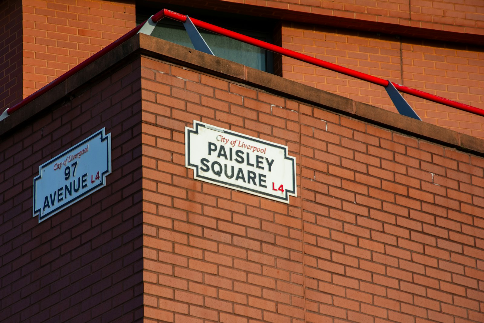 Paisley Square and 97 Avenue street signs at Anfield