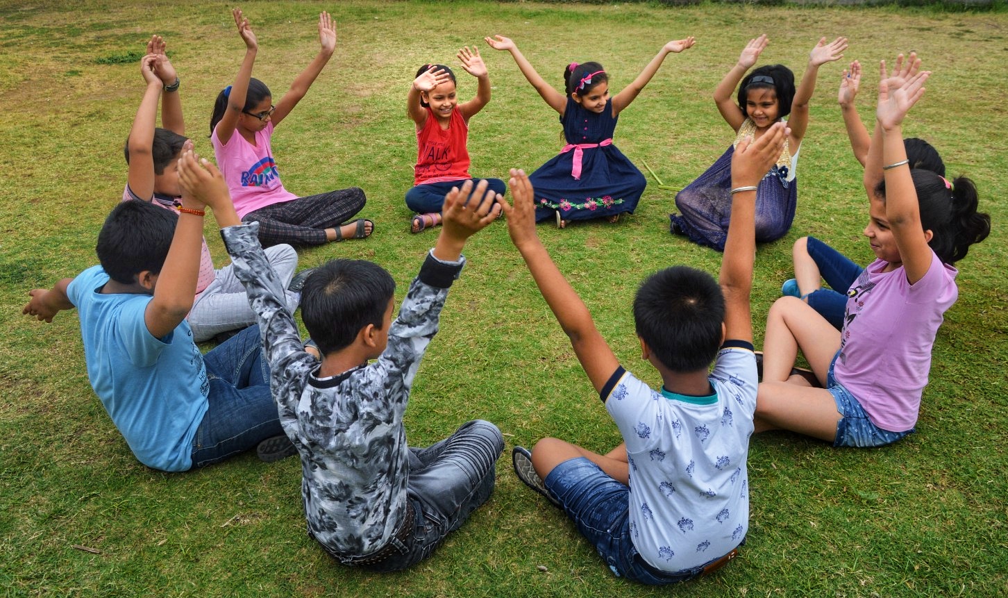 Joyful children outdoors in sunlight
