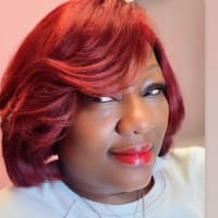 Shammara (red) E., mobile hairstylist/mobile barber at Highland Park