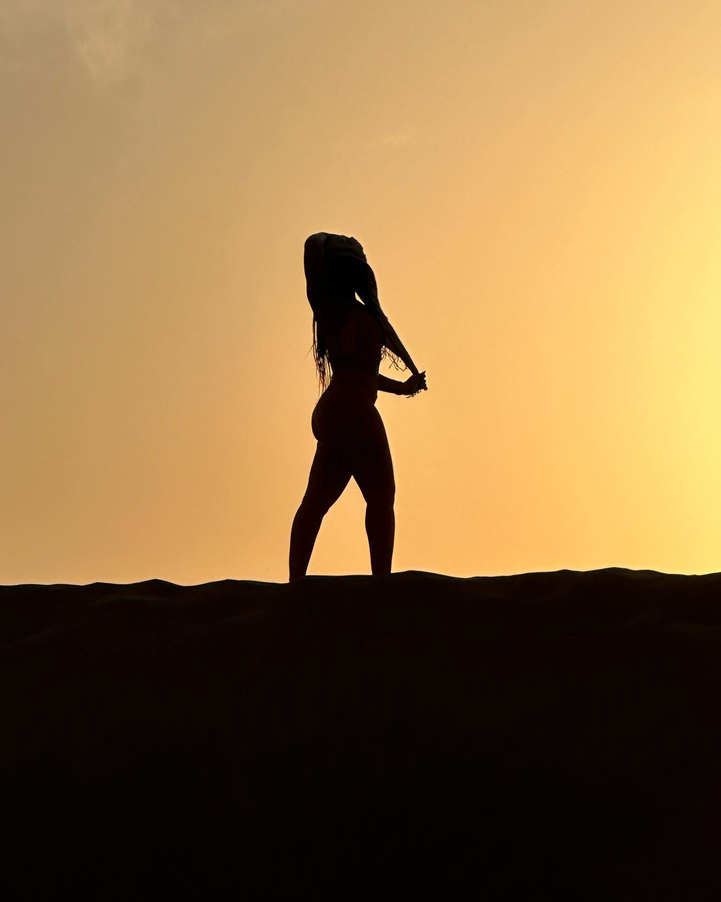 An Nxlevel traveler at sunset outside Dubai
