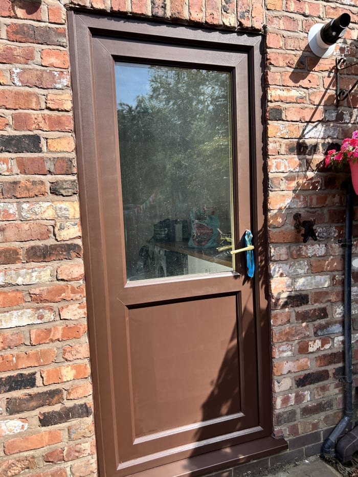 The UPVC door after its third coat