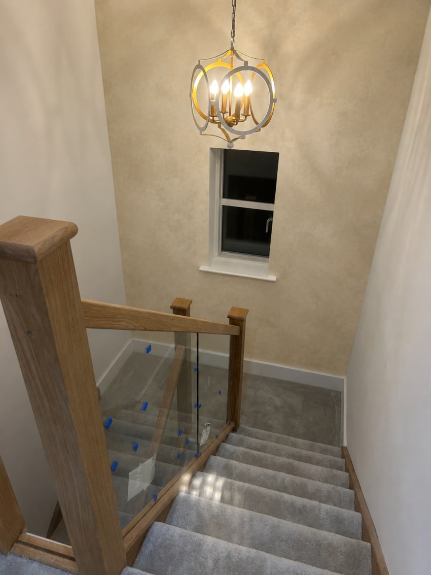 Limewash carried up a stairwell in Wigan