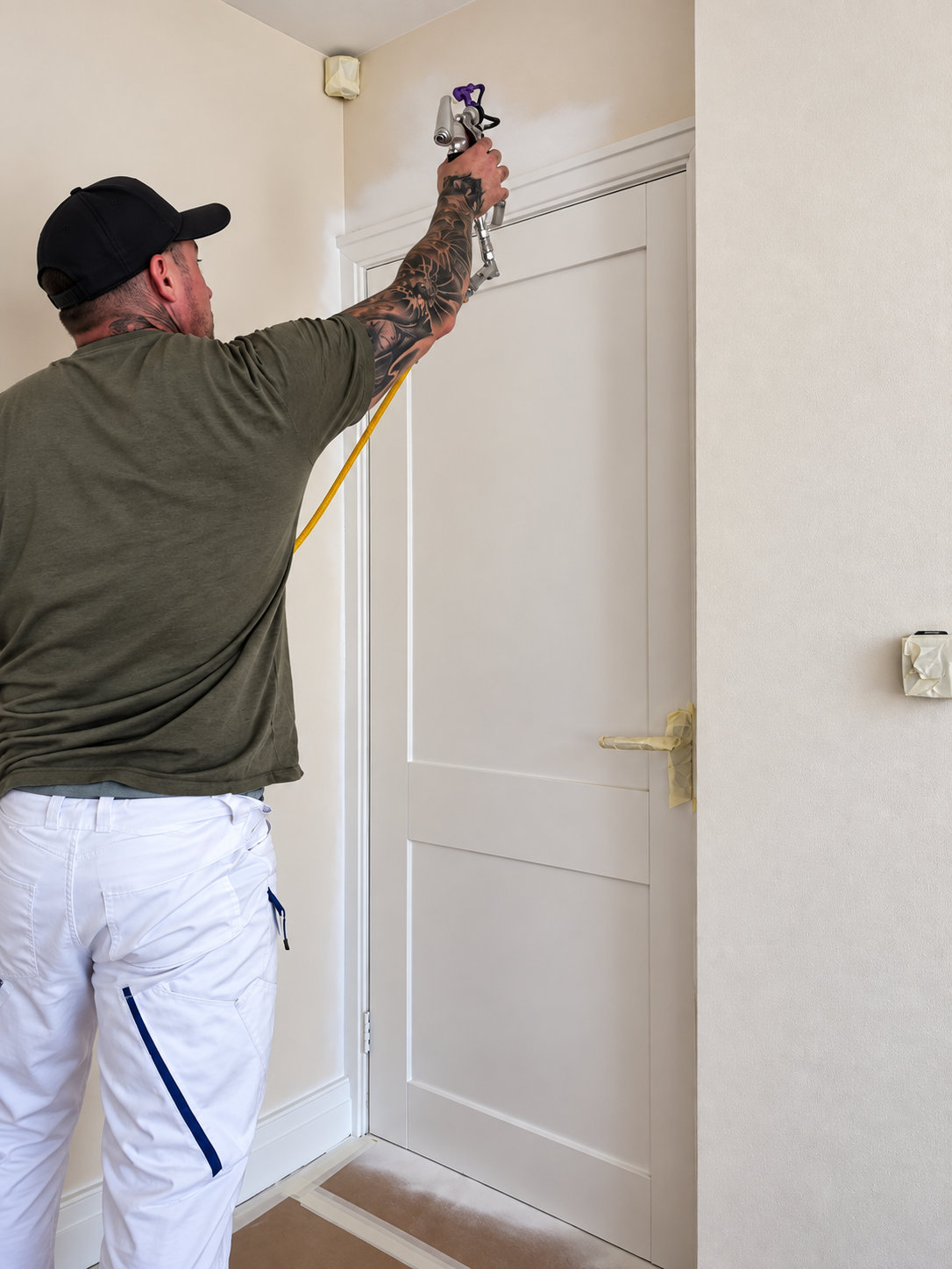 Lower-pressure spraying a door in Lymm
