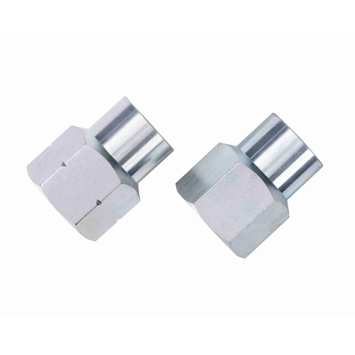 Angled view of a pair of CNC-machined 1018 cold rolled steel hexed tube adapters and welded bungs with 1 1/2 inch ID.