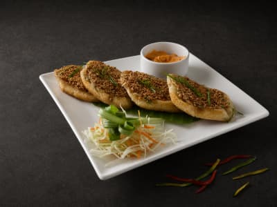 Xin Corn & Water Chestnut Toast — pan-fried sesame toast with sweet corn, water chestnut, coriander