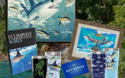 Enter for a chance to win a trip for four to Discovery Cove including dolphin swim and shark interaction experiences plus a Guy Harvey prize package.