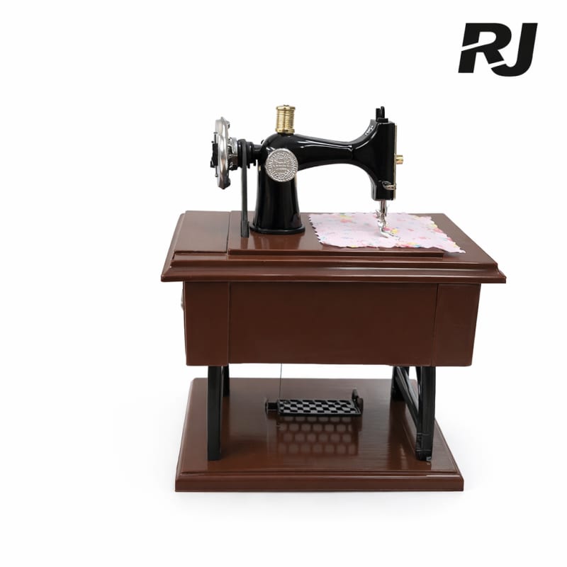 Caja musical est maquina de coser