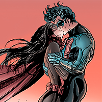 Nightwing/Huntress issue 2. Dick and Helena kiss, before an orange sunset. They're in their vigilante suits, her hands on his chest, and his on her arm and her back, with the wind making their hair and Helena's cape fly.