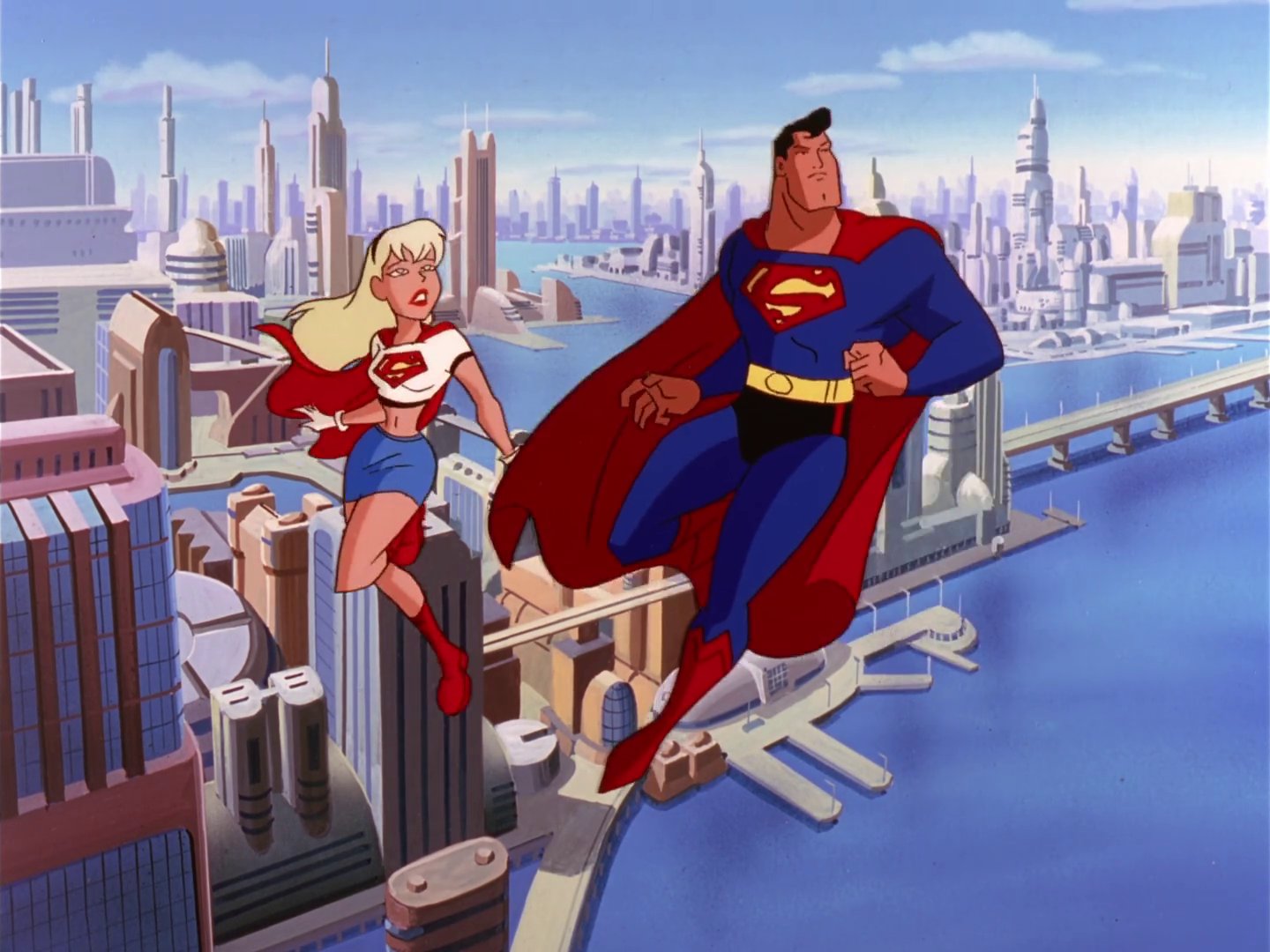 Screenshot from Superman: The Animated Series. Supergirl and Superman fly over Metropolis, looking at a threat above them. Kara looks alarmed, Clark determined.