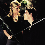 Buffy and Angel(us) promotional picture of the two of them fighting with swords, close together with Angel looking up at her
