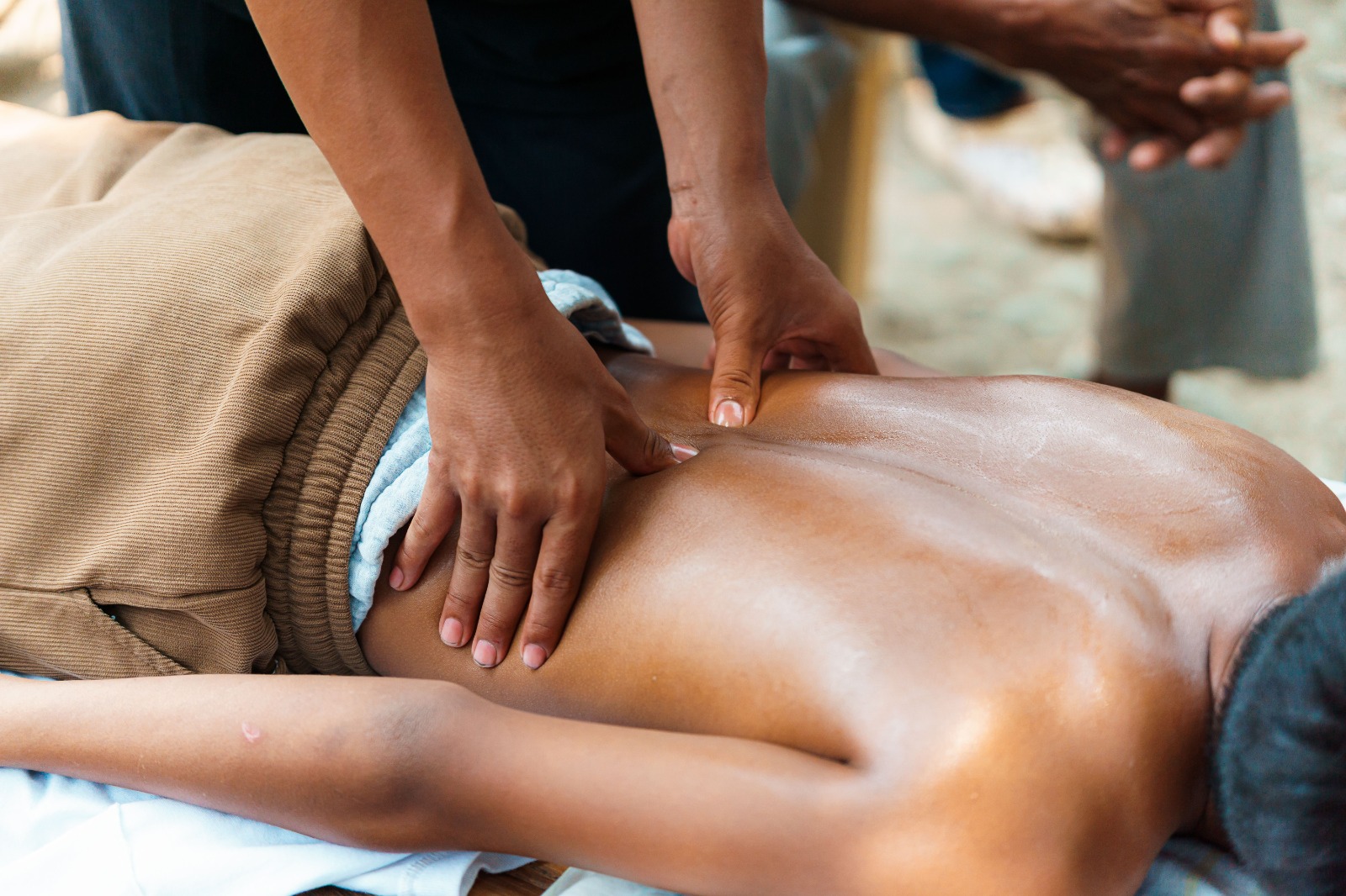Massage therapist during a session