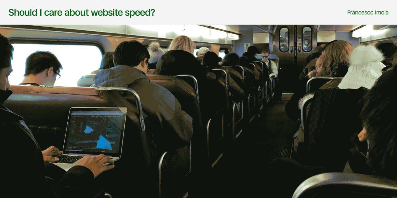 a person working on their laptop on a bus