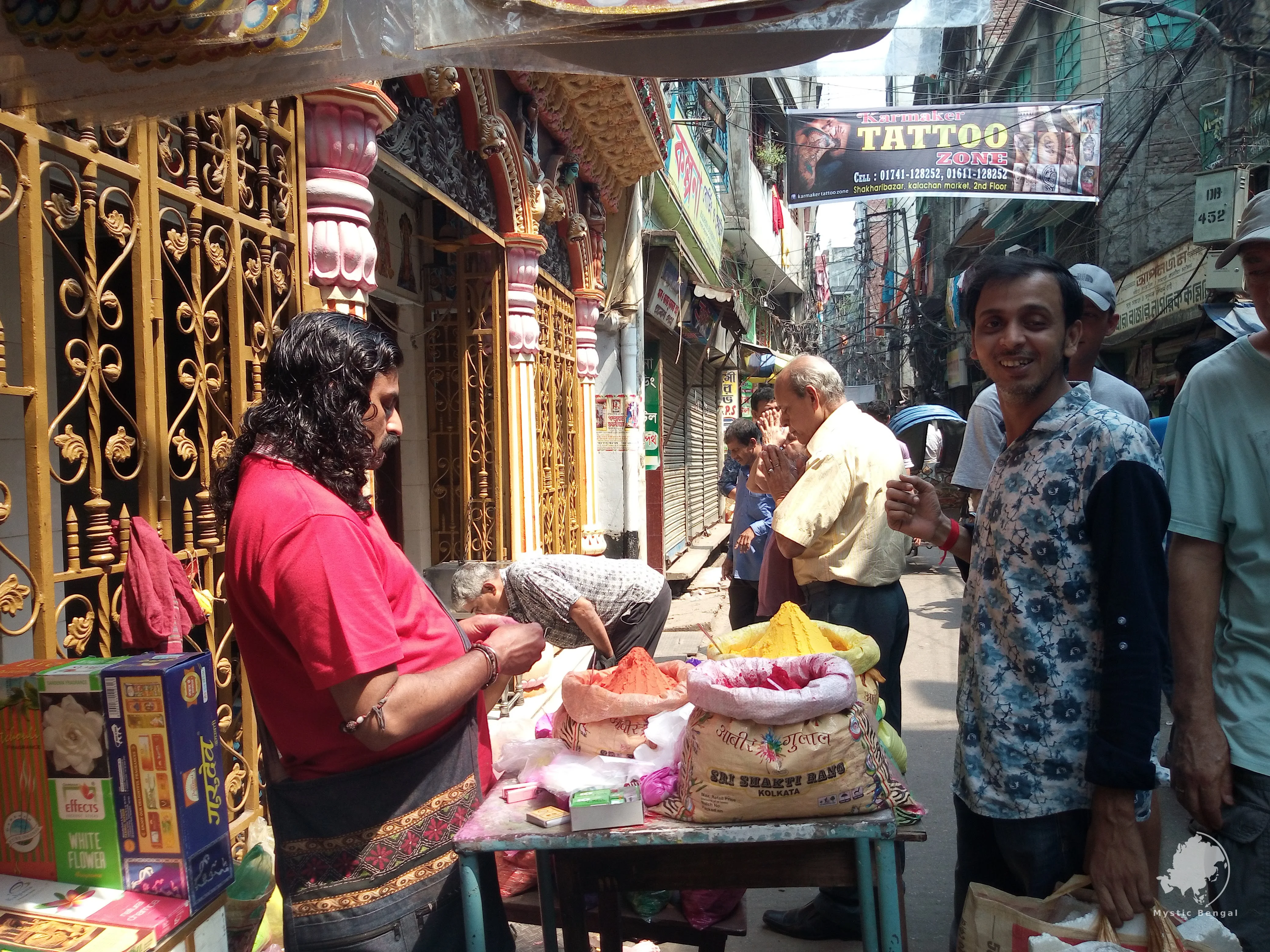 Hindu street, Dhaka City, Bangladesh, man selling color