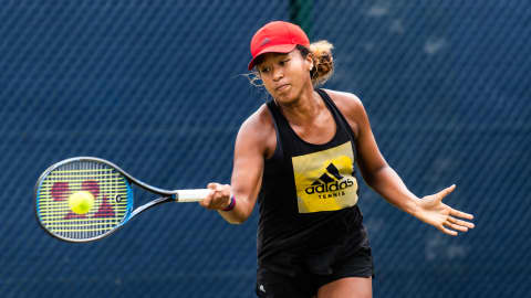 Iga Swiatek Glides Past Naomi Osaka to Reach US Open Third Round