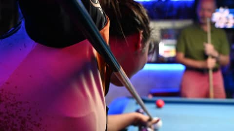 Midnight Badminton: Players Clash with Cruel Scheduling and Poor Arrangements