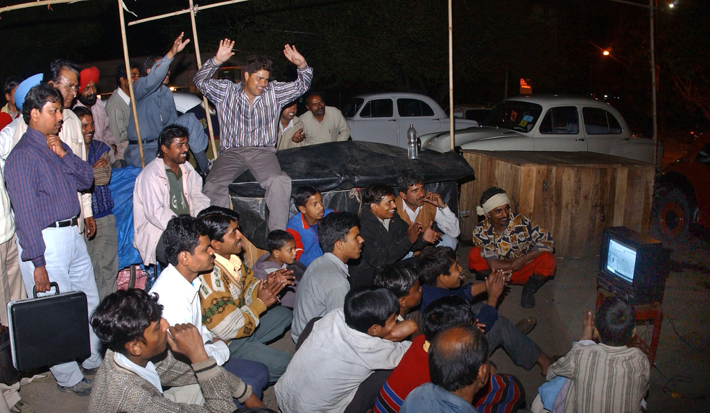 crowd cheering at cricket match India