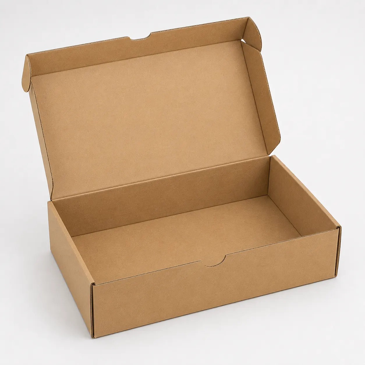 Open brown corrugated courier box for e-commerce product packing and delivery