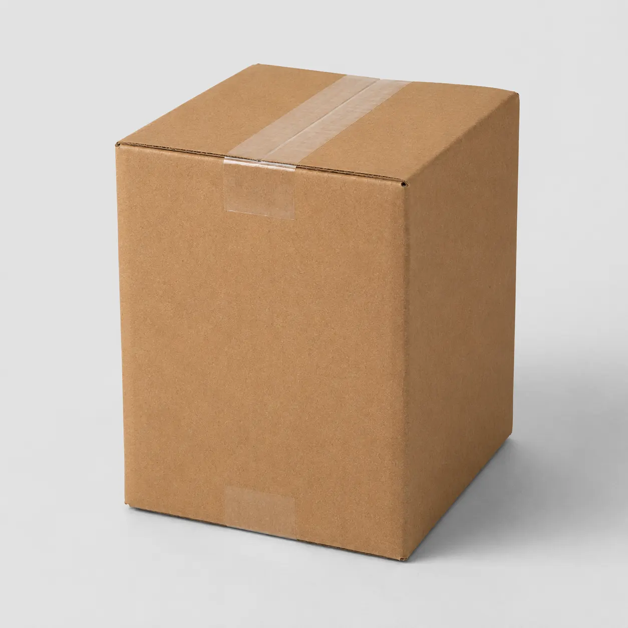 Front angle view of 5.5x5.5x8 inch brown taped corrugated carton box