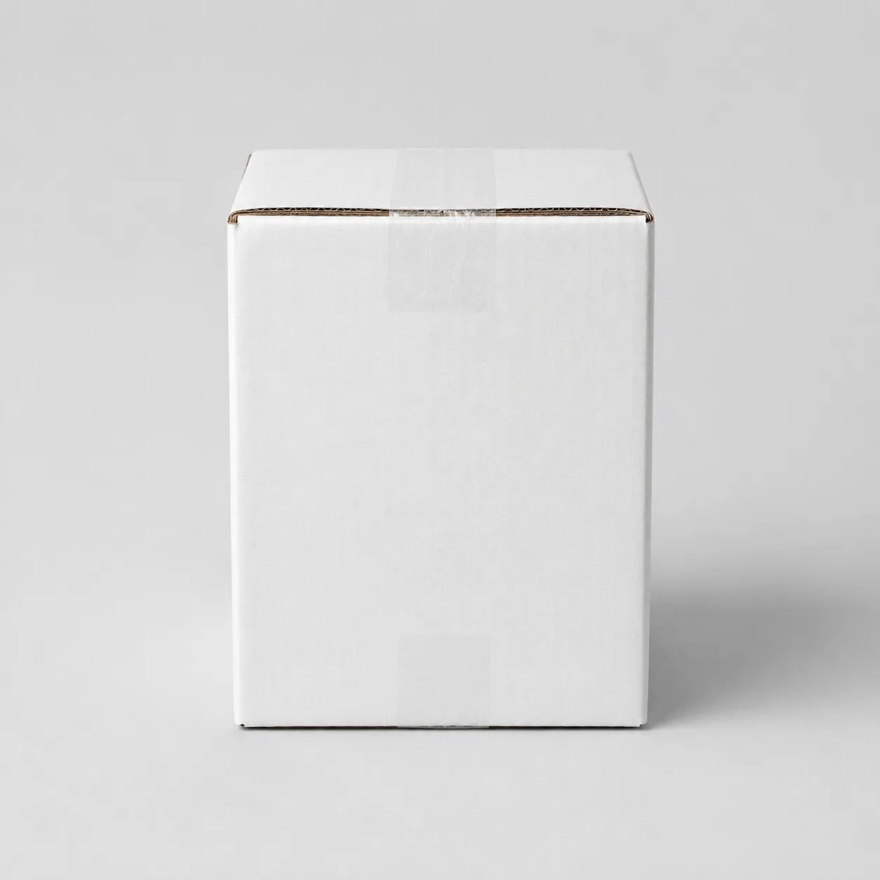 Top view of 5.5x5.5x8 inch white carton box with adhesive tape seam