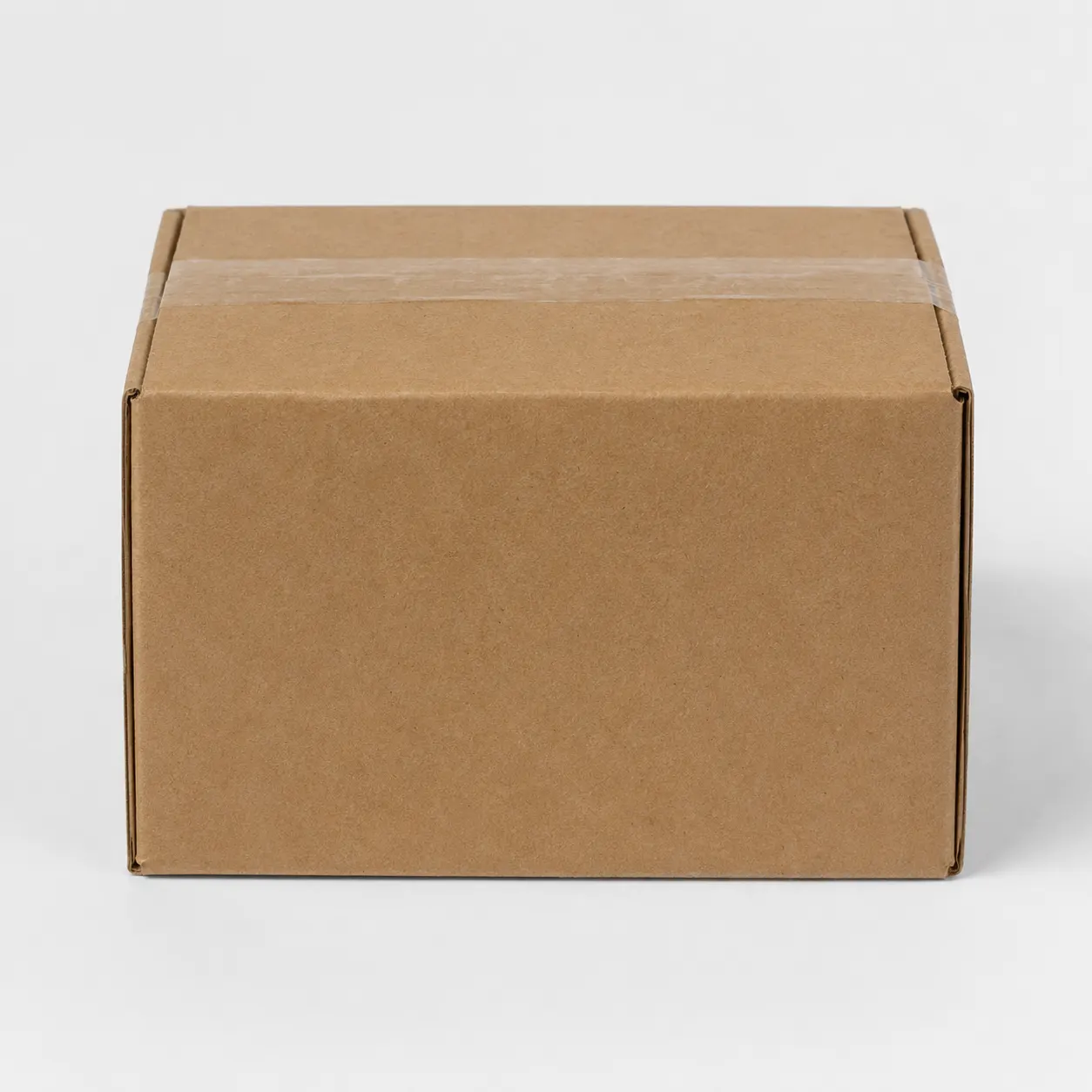 Front angle view of 5x5x2.75 inch brown taped corrugated carton box