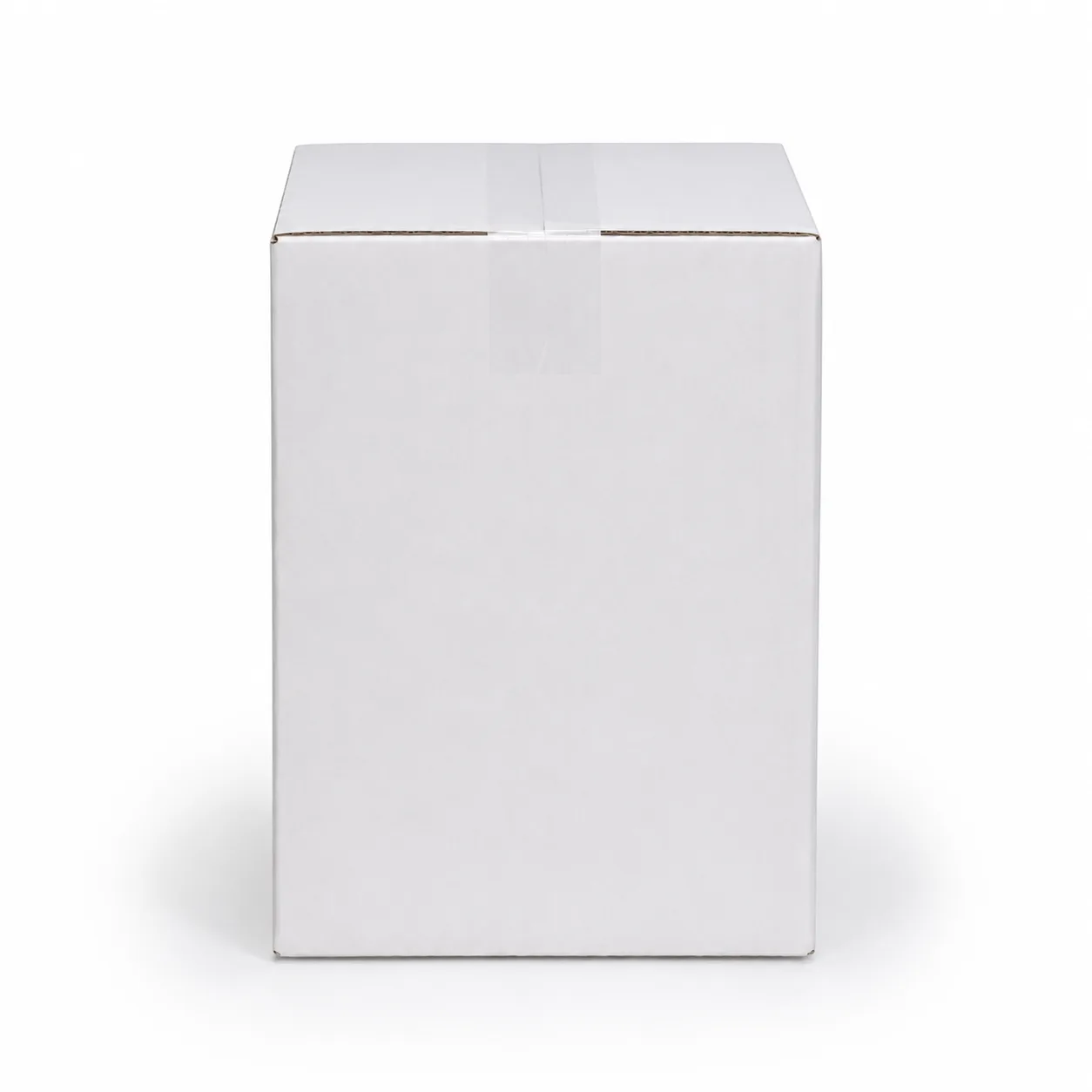Close-up view of white corrugated carton material and tape area
