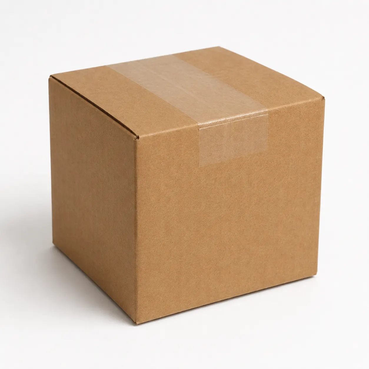 Close-up view of brown corrugated carton material and tape area