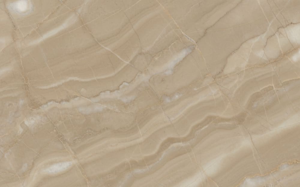 Bursa Beige (Light) marble — polished slab surface showing Cream coloring. Origin: Turkey (Bursa). Hardness: 3 Mohs. Acid sensitivity: high.