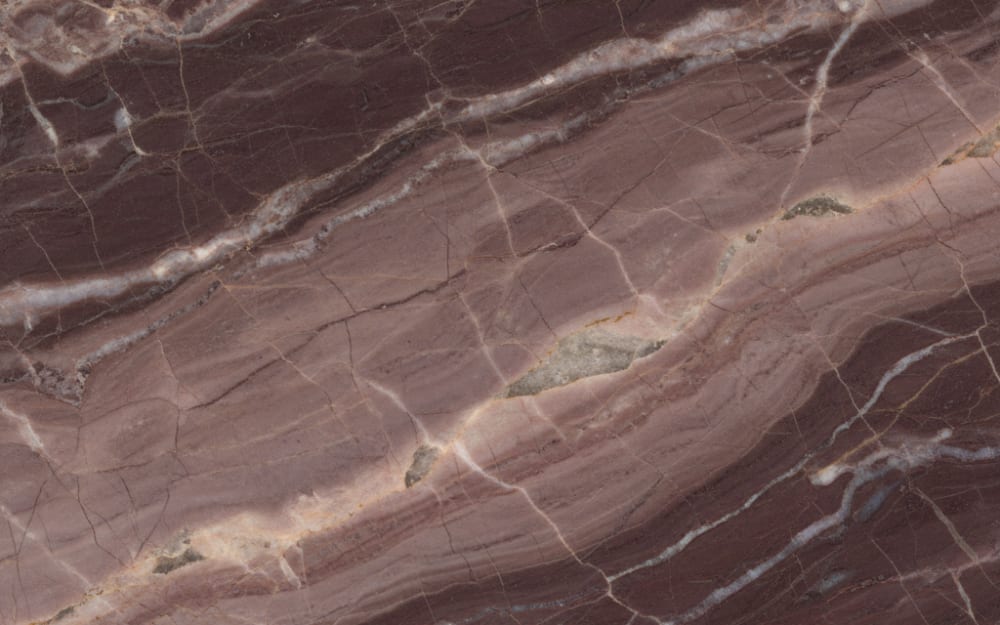 Calacatta Arabescato Rosso marble — polished slab surface showing Red/Pink coloring. Origin: Italy (Carrara). Hardness: 3 Mohs. Acid sensitivity: high.