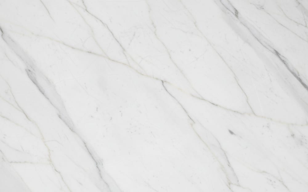 Cedar Marble marble — polished slab surface showing White coloring. Origin: Brazil. Hardness: 3 Mohs. Acid sensitivity: high.