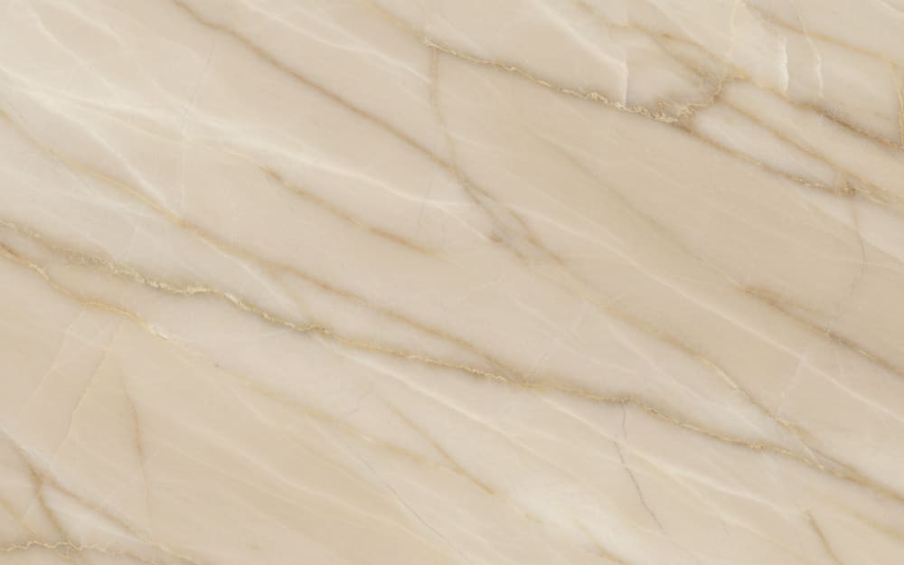 Crema Cenia marble — polished slab surface showing Cream coloring. Origin: Spain (Castellón). Hardness: 3 Mohs. Acid sensitivity: high.