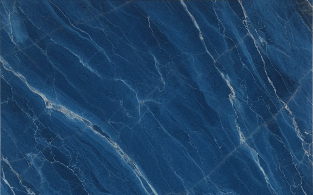 Cristalita Blue marble — polished slab surface showing Blue coloring. Origin: Brazil. Hardness: 3 Mohs. Acid sensitivity: high.