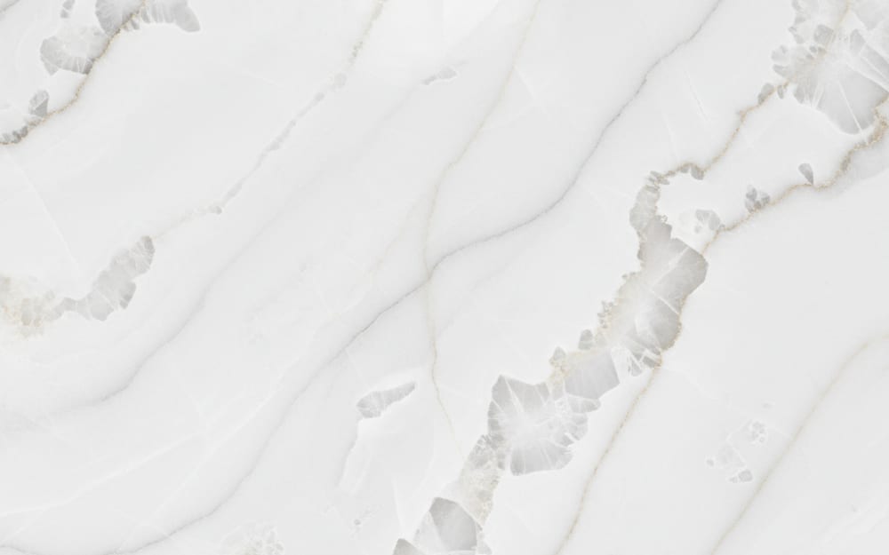 Crystal Ice quartzite — polished slab surface showing White coloring. Origin: Brazil. Hardness: 7 Mohs. Acid sensitivity: none.