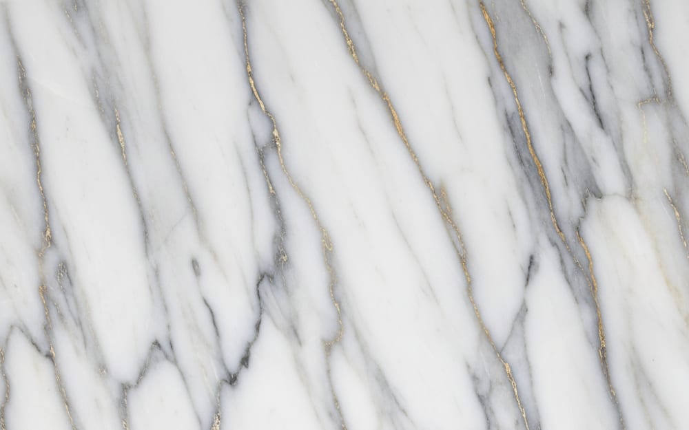 Fantasy River marble — polished slab surface showing White coloring. Origin: Brazil. Hardness: 3 Mohs. Acid sensitivity: high.