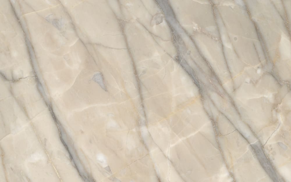 Fior di Pesco Classico marble — polished slab surface showing White coloring. Origin: Italy (Tuscany). Hardness: 3 Mohs. Acid sensitivity: high.