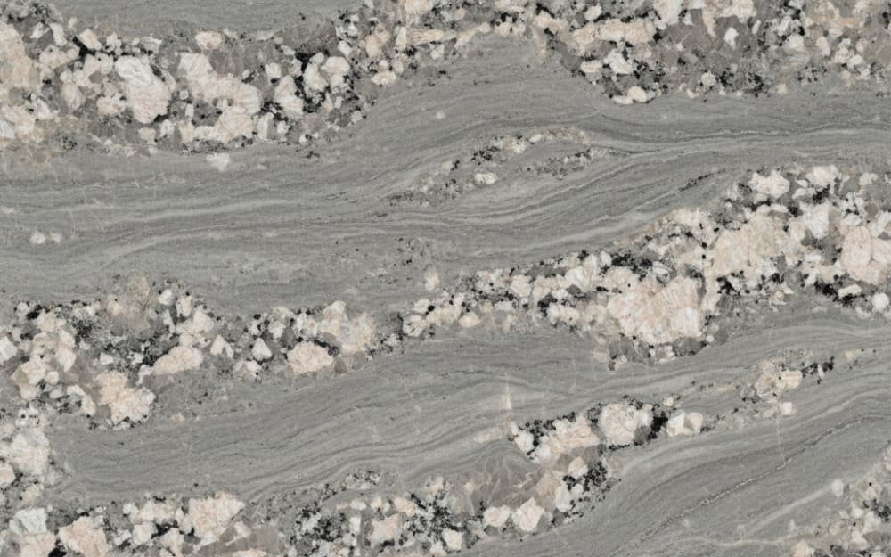 Fortaleza granite — polished slab surface showing Grey coloring. Origin: Brazil. Hardness: 6 Mohs. Acid sensitivity: none.