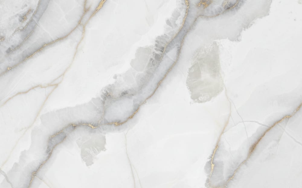 Ice Flakes quartzite — polished slab surface showing White coloring. Origin: Brazil. Hardness: 7 Mohs. Acid sensitivity: low.