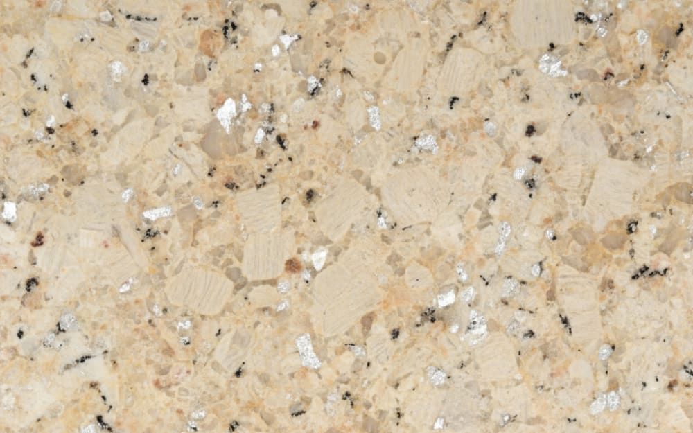 Ivory Fantasy granite — polished slab surface showing Cream coloring. Origin: Brazil. Hardness: 6 Mohs. Acid sensitivity: none.