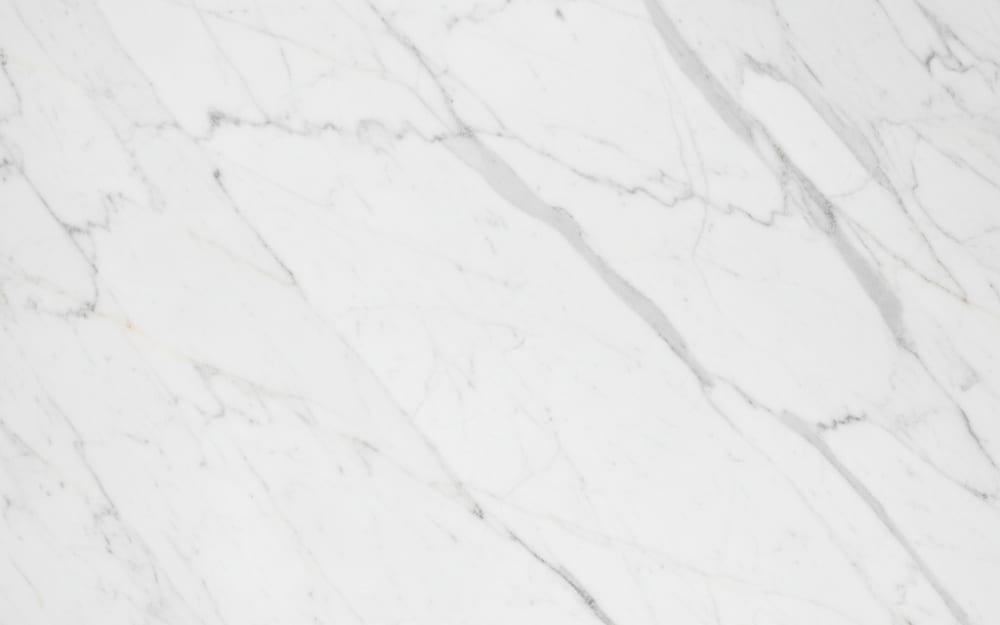 Lasa (Laas) White marble — polished slab surface showing White coloring. Origin: Italy (Alto Adige / South Tyrol). Hardness: 3 Mohs. Acid sensitivity: high.