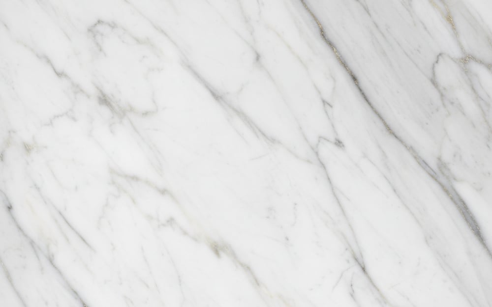 Nebel marble — polished slab surface showing White coloring. Origin: Italy / Turkey. Hardness: 3 Mohs. Acid sensitivity: high.