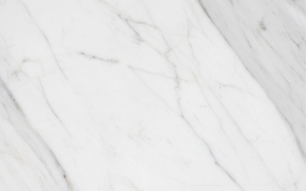 Nuvolato (Brazilian) marble — polished slab surface showing White coloring. Origin: Brazil. Hardness: 3 Mohs. Acid sensitivity: high.