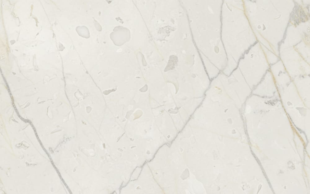 Pietra di Vicenza limestone — polished slab surface showing White coloring. Origin: Italy (Vicenza, Veneto). Hardness: 3 Mohs. Acid sensitivity: high.