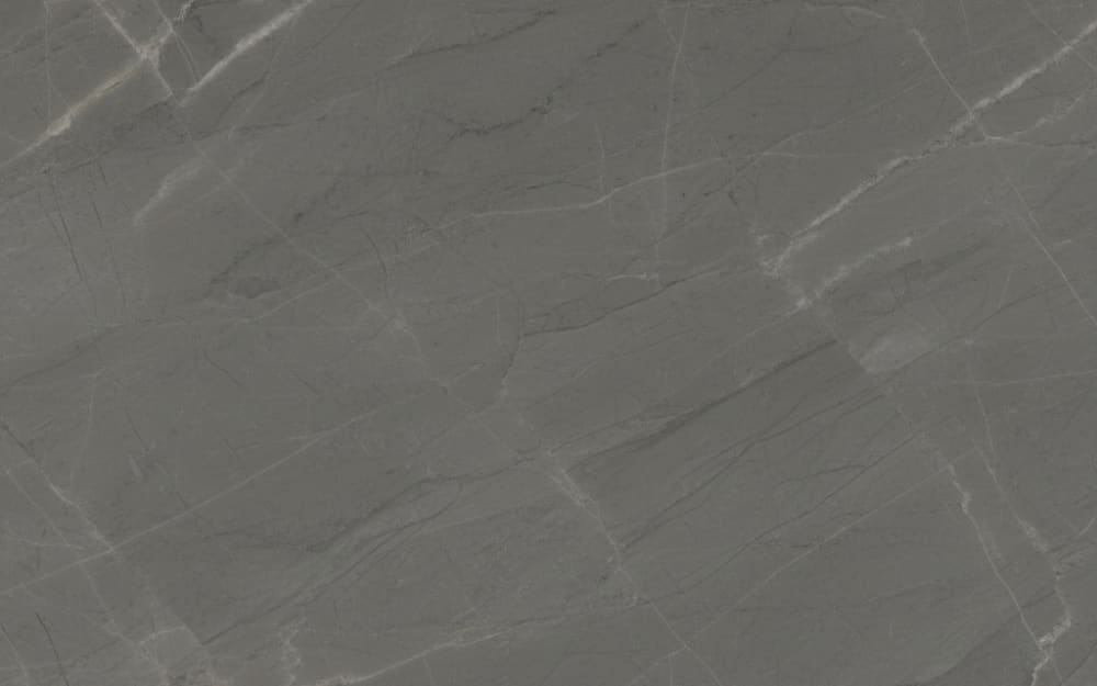 Pietra Gray marble — polished slab surface showing Grey coloring. Origin: Iran. Hardness: 3 Mohs. Acid sensitivity: high.