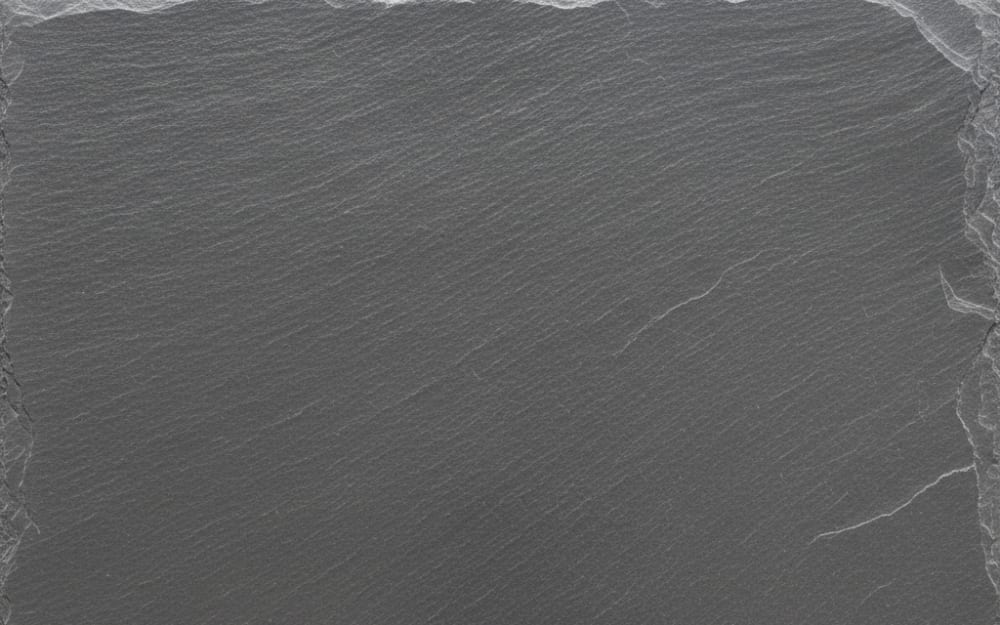 Roofing Slate slate — polished slab surface showing Grey coloring. Origin: USA (Vermont / Pennsylvania). Hardness: 2.5 Mohs. Acid sensitivity: medium.