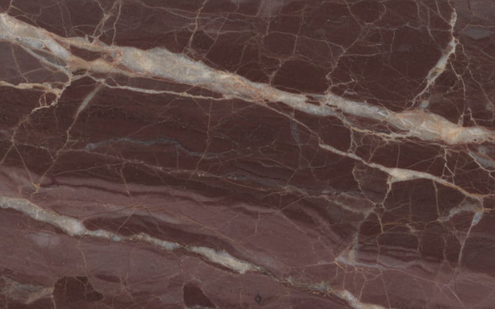 Rosso Francia marble — polished slab surface showing Red/Pink coloring. Origin: France. Hardness: 3 Mohs. Acid sensitivity: high.